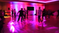 This image shows using moving heads up high with the right gobos creates dynamic imagery on the dance floor creating a festive party atmosphere.